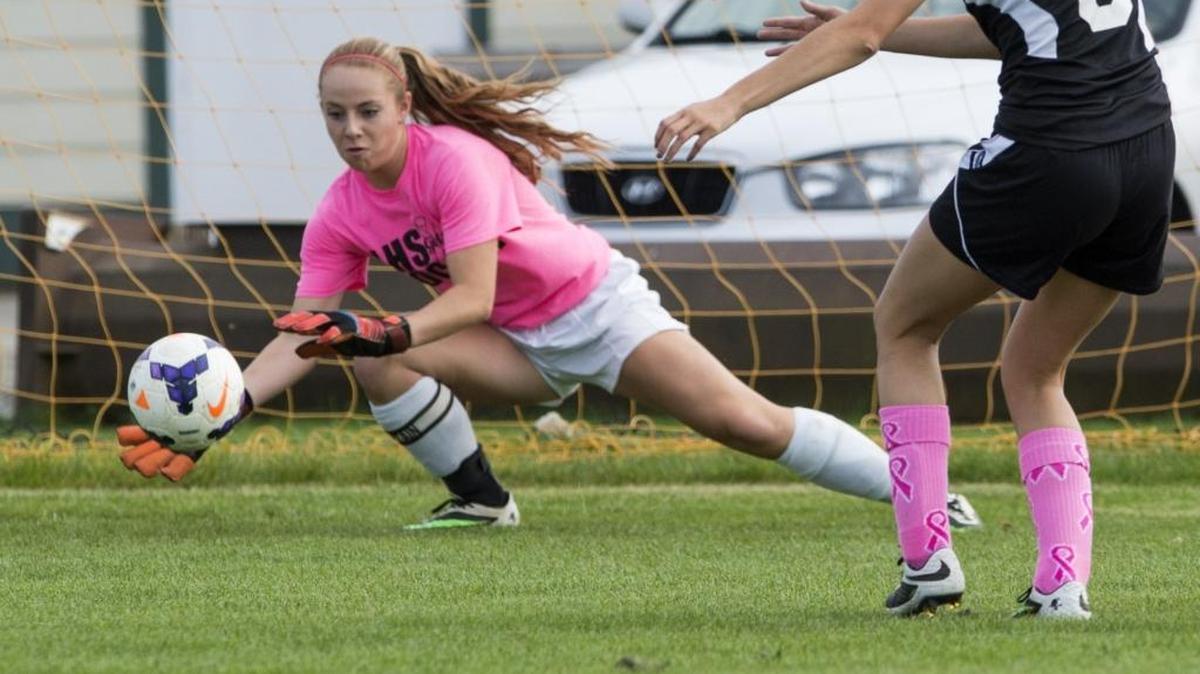 Lynden’s Emily Holt dives to stop a shot on goal during a game against Meridian Oct. 2, 2014. Holt is expected to sign to play soccer for Central Washington.