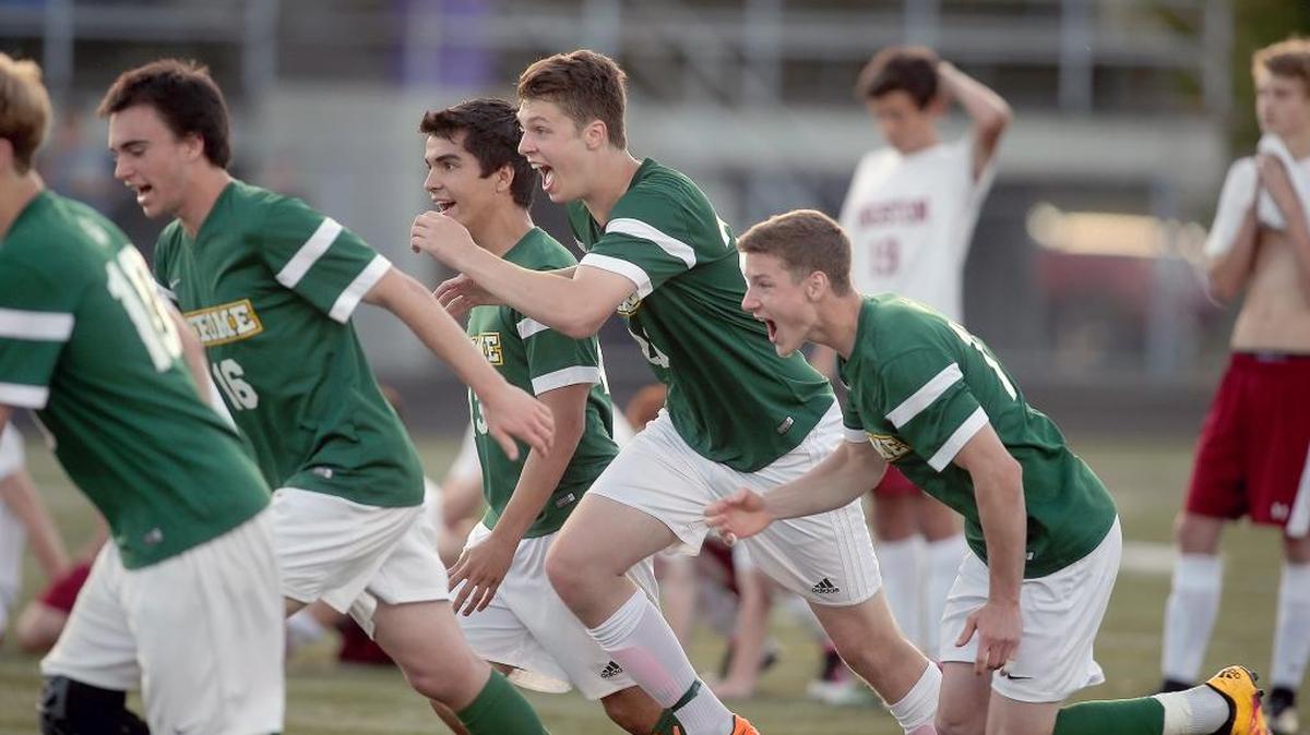 Sehome players rush the field after their shoot out win against Kingston on Tuesday, May 17, at North Kitsap High School.