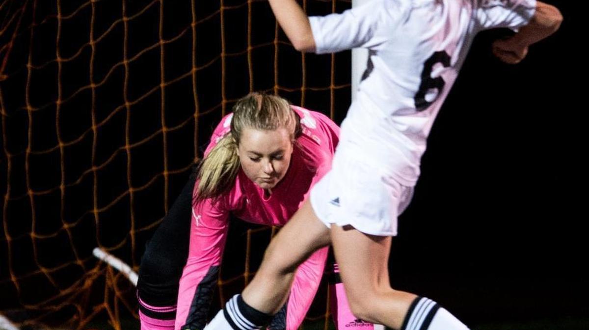 Meridian’s Micaela Pimento shoots the ball past Sultan's Bailey Bierbrauer for a goal on Wednesday, Oct. 28, at Lummi Nation School. Meridian won the game 5-1.