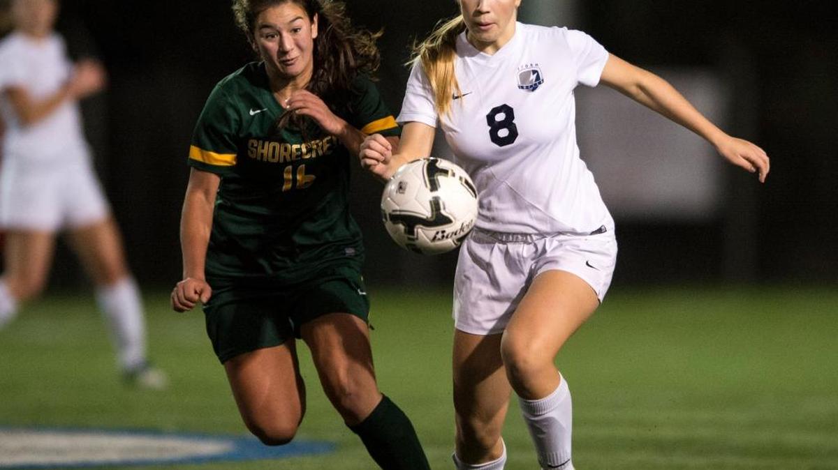 Squalicum's Sarah Hulbert battles Shorecrest’s Aleah Redfield for possession of the ball during Squalicum's 2-1 victory over Shorecrest to win the 2A girls soccer state championship in November 2014. With strong midfield play, the Storm is hoping to repeat with the 2A state playoffs begining.