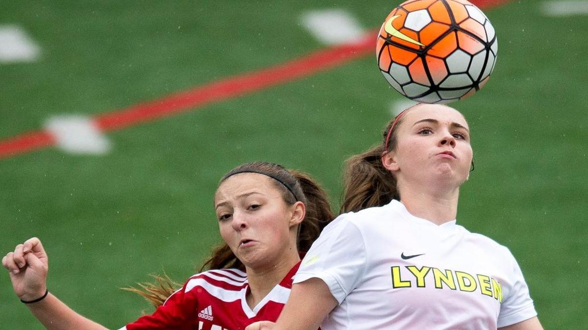 Lynden’s Peyton Fullner, right, battles Mountlake Terrace’s Mattie McAllister for control of the ball Oct. 29 at Civic Stadium in Bellingham.