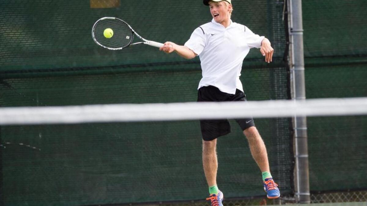 Sehome's Max Schmotolokha returns the ball to his opponent on Wednesday, Sept. 23, at Sehome High School in Bellingham.