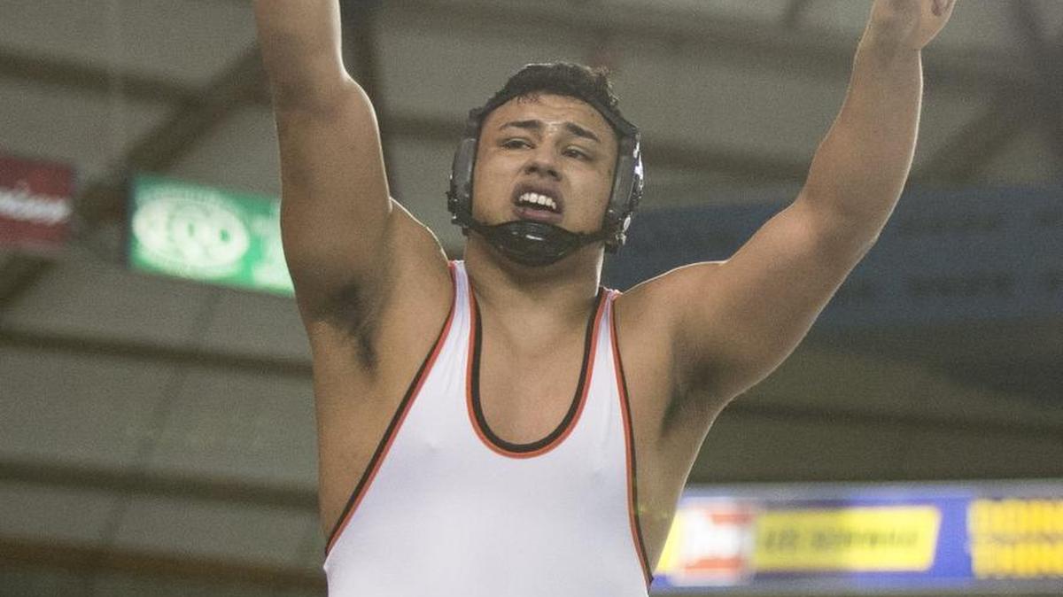 Blaine’s Saul Magallon celebrates after defeating River Ridge’s Blayne Haderman to win the 2A 220-pound state championship at Mat Classic XXIX Feb. 18, at the Tacoma Dome. Magallon is one of 25 Whatcom County wrestlers scheduled to face the Japanese national team Thursday at Blaine.