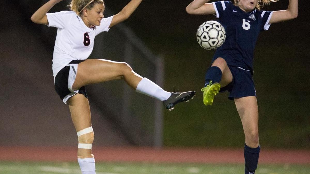 
Squalicum’s Abbie Lease blocks a shot on goal by Bellingham's Brooke Baker on Thursday, Sept. 17, in Bellingham.
