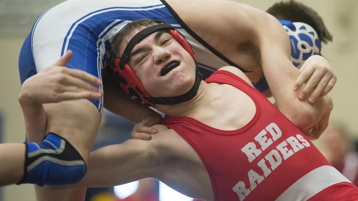 Bellingham's Indiana Casas takes down Sedro-Woolley's Ethan Chu in a 106 pound match at the Class 2A Regional Wrestling Tournament on Saturday, Feb. 11, at Blaine High School.