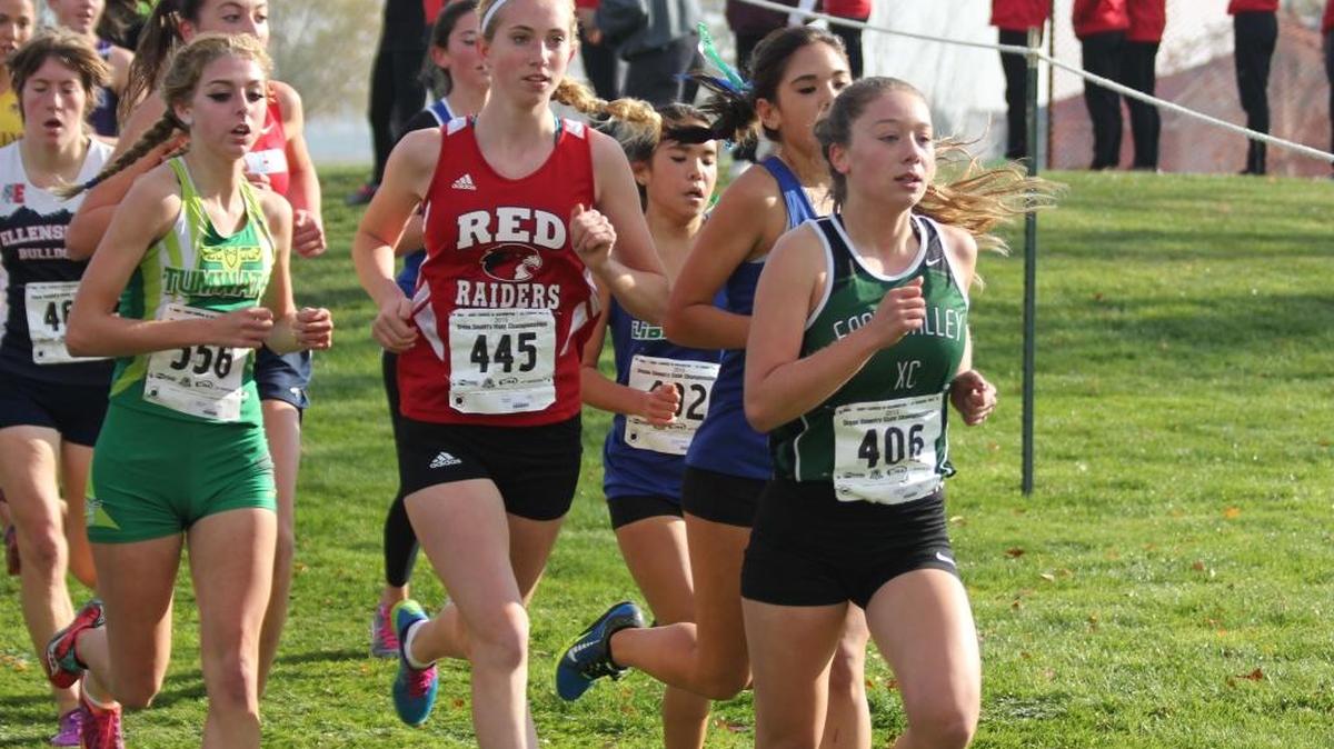 Bellingham fresham Annika Reiss (445) works with the lead runners at the Class 2A State Championships on Saturday, Nov. 7, in Pasco.