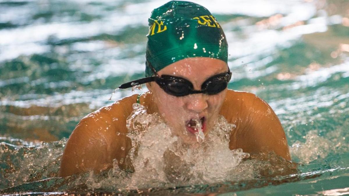 Sehome’s Leah Day swims to a first-place finish in the 100-meter breaststroke at a meet against Bellingham at Arne Hanna Aquatic Center on Tuesday, Oct. 7, 2014, in Bellingham.