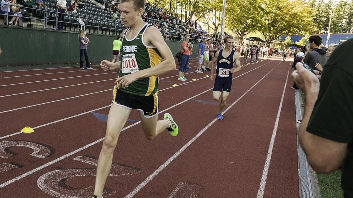 Sehome Colton Johnsen crosses the finish line to earn second place with a time of 10 minutes, 13 seconds during the Sehome Invitational Cross Country meet Sept. 12 at Civic Field.