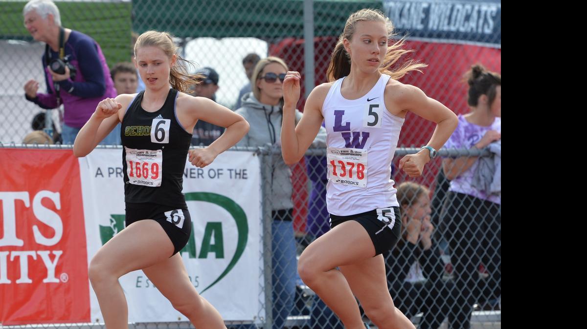 
Sehome's Emily Pittis and Lake Washington's Katia Matora look over their shoulders for the rest of the runners during the finals race of the 1,600 meter at the 2A/3A State Track and Field Championships held at Mt. Tahoma High School on Thursday May 29, 2014, in Tacoma.

