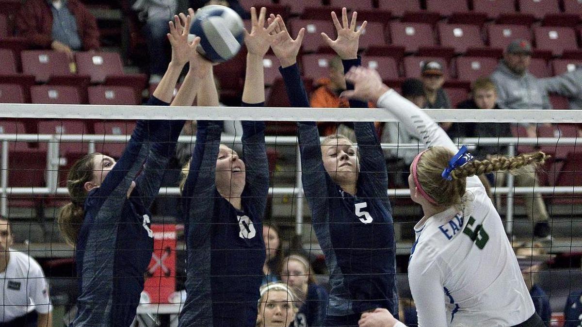 Lynden Christian's Sofia Fransen (6), Hannah Rusnak (14) and Avery Dykstra can't handle a spike by Lakeside's Lexi Mikkelsen (6) during the championship match of the Class 1A Volleyball State Tournament Saturday at the Yakima Valley SunDome. Lakeside beat LC 3-1.