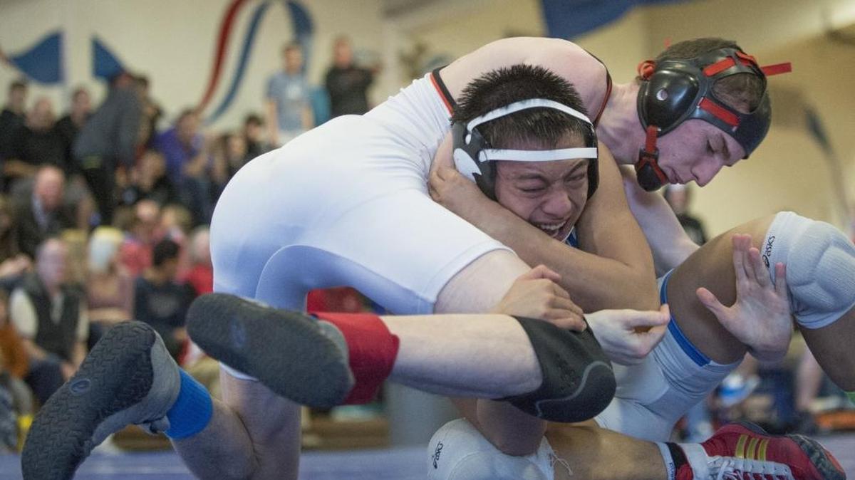 Blaine’s Anthony Frey attempts to put Olympic's Jayden Fernandez on his back at the Class 2A Regional Wrestling Tournament on Saturday, Feb. 14, at Sedro-Woolley High School.