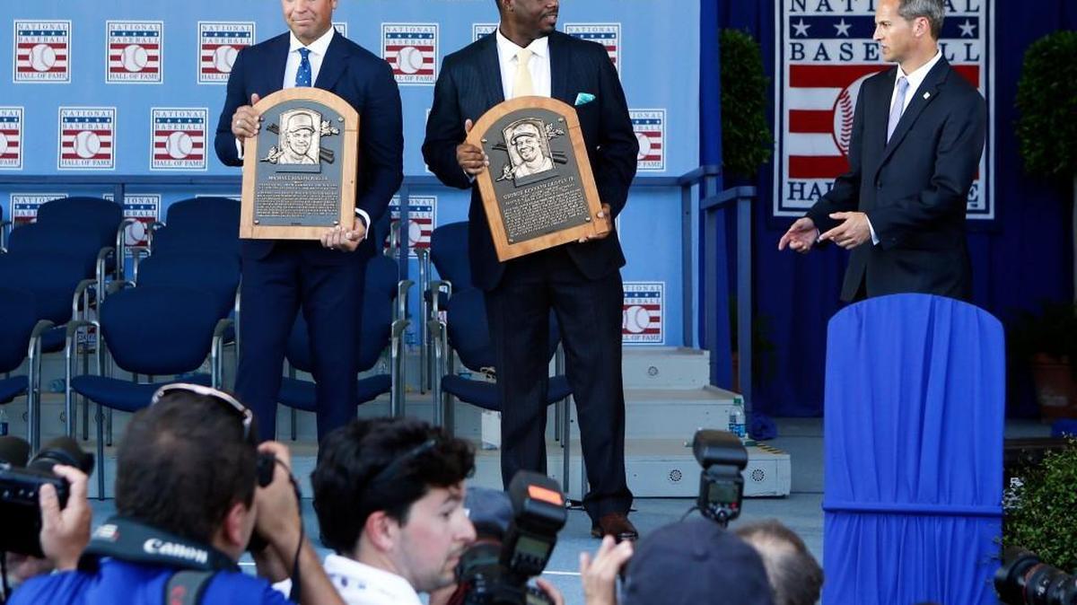 National Baseball Hall of Fame inductees Mike Piazza, left, and Ken Griffey Jr. hold their plaques for photos after the induction ceremony at Clark Sports Center on Sunday, July 24, 2016, in Cooperstown, N.Y.