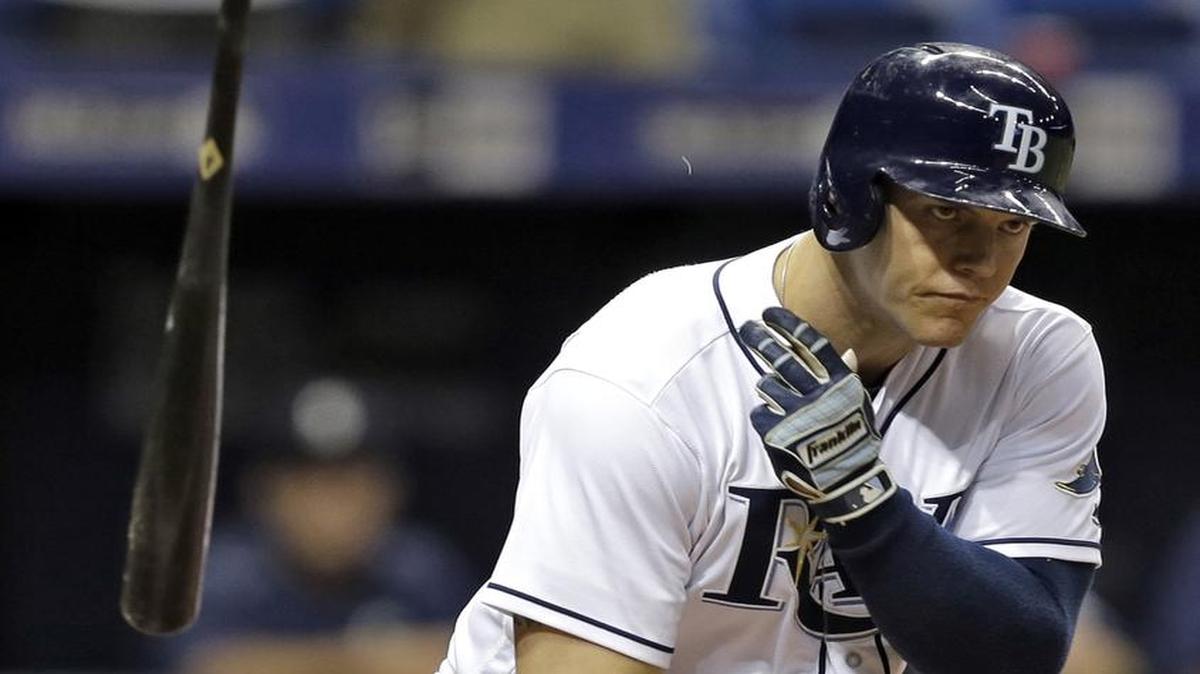 Tampa Bay Rays’ Logan Morrison flings his bat as he draws a bases loaded walk from Seattle Mariners relief pitcher Mike Montgomery during the 13th inning of a baseball game Wednesday, June 15, 2016, in St. Petersburg, Fla. The Rays won the game 3-2.