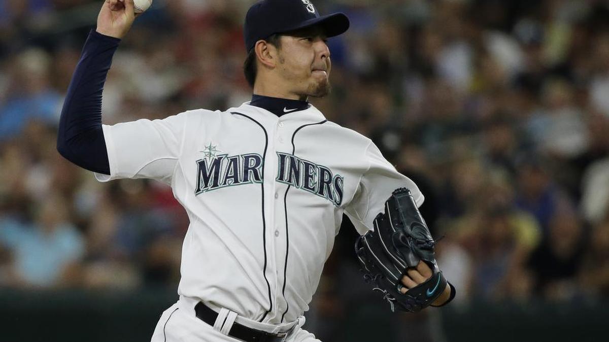 
Seattle Mariners starting pitcher Hisashi Iwakuma throws to the Baltimore Orioles during the fifth inning of a baseball game, Wednesday, Aug. 12, 2015, in Seattle.
