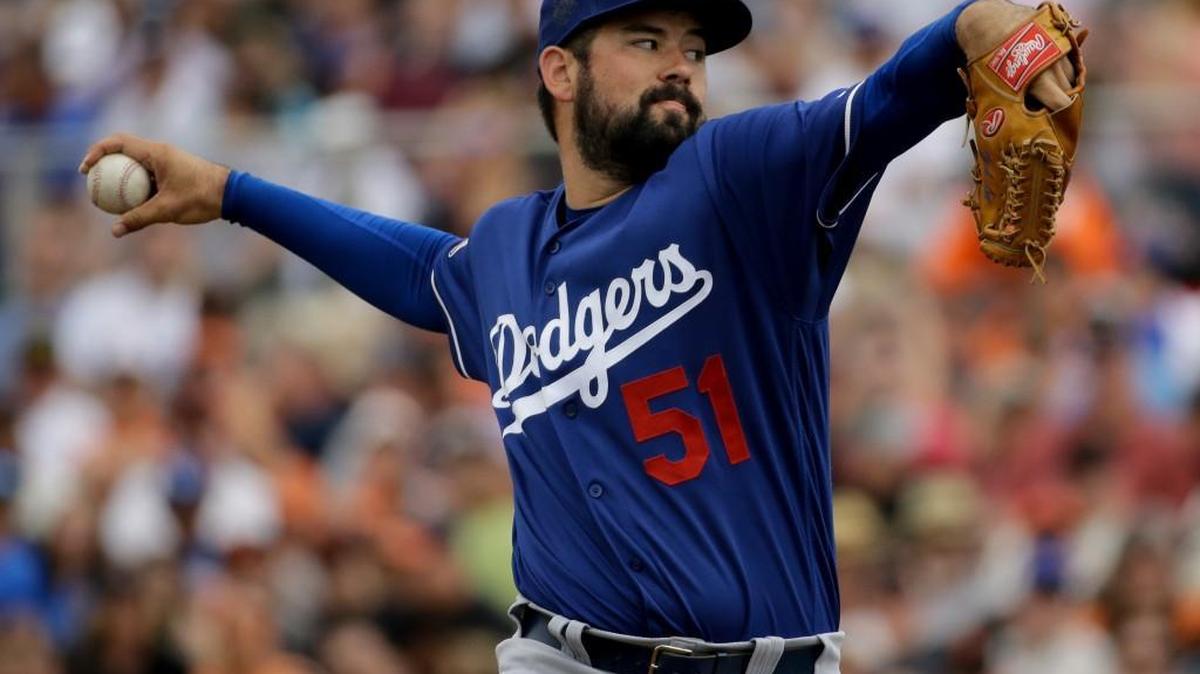 The Mariners acquired pitcher Zach Lee from the Dodgers in a Sunday night trade for shortstop Chris Taylor.