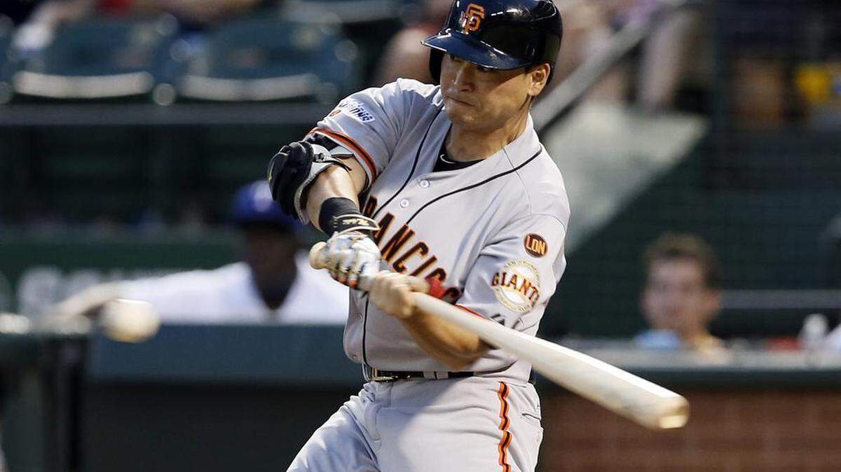 San Francisco Giants' Nori Aoki of Japan at bat against the Texas Rangers in the fourth inning of a baseball game Friday, July 31, 2015, in Arlington, Texas.