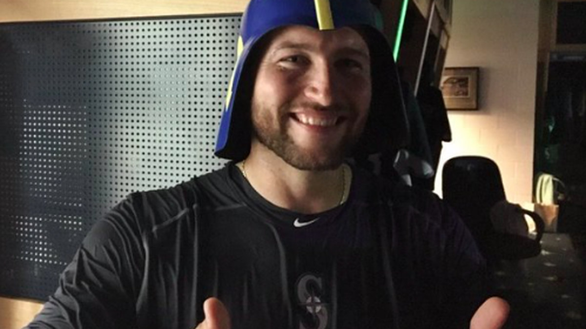 Chris Iannetta happily wears the “swelmet” after hitting a walk-off home run in Wednesday’s victory over Tampa Bay.