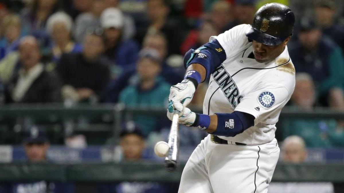 Seattle Mariners’ Robinson Cano hits a solo home run during the eighth inning of a baseball game against the Cleveland Indians, Thursday, June 9, 2016, in Seattle. The shot was Cano’s second home run in the game.