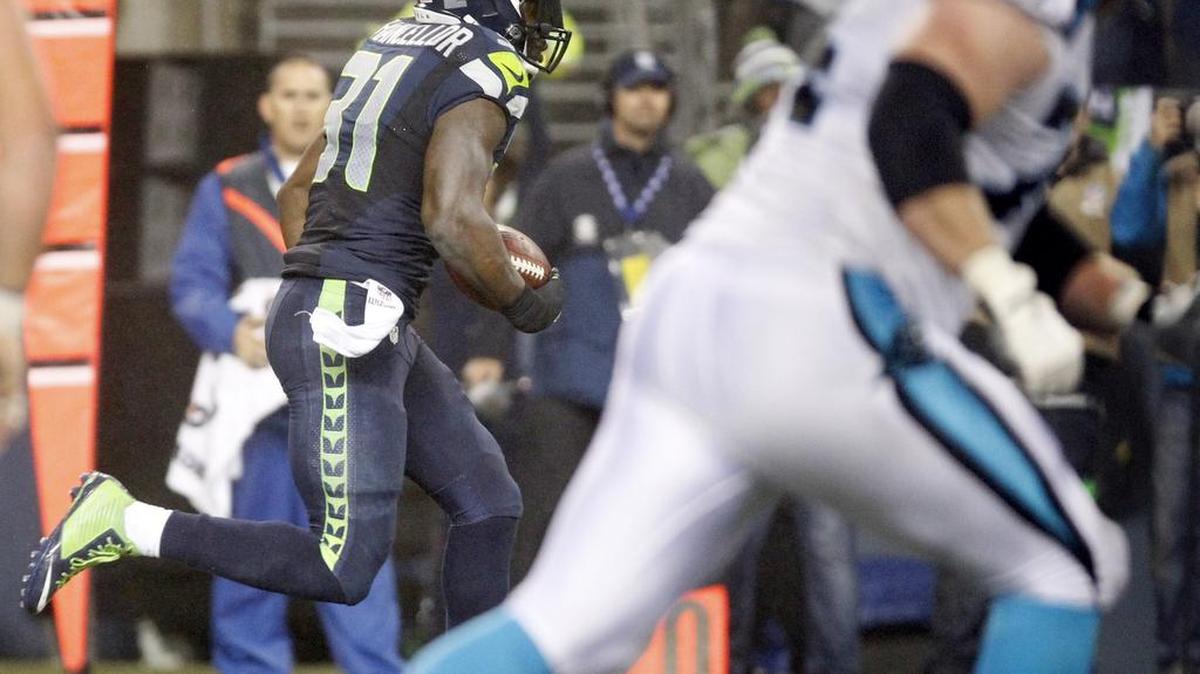 
Seahawks safety Kam Chancellor runs an interception back 90 yards for a touchdown in the fourth quarter Jan. 10 against the Carolina Panthers in NFC divisional playoff game in Seattle. 
