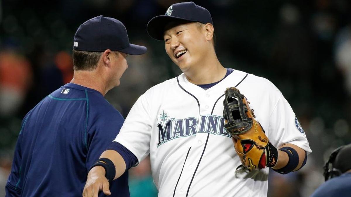 Seattle Mariners' Dae-Ho Lee smiles after the team beat the Tampa Bay Rays in a baseball game Tuesday, May 10, 2016, in Seattle. The Mariners won 6-4.