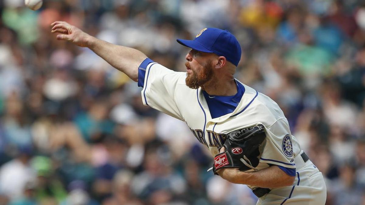 
Seattle Mariners pitcher Logan Kensing arrived at Safeco Field during the second inning Sunday but was brought into the game against the Chicago White Sox in the sixth inning.

