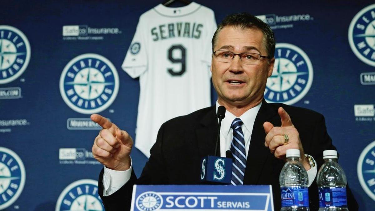 Scott Servais talks to reporters in October after he was introduced as the new manager of the Seattle Mariners . As he held different positions in the front office of various organizations, Scott Servais was building a portfolio of experience he hoped someday would land him back on the field as a manager.