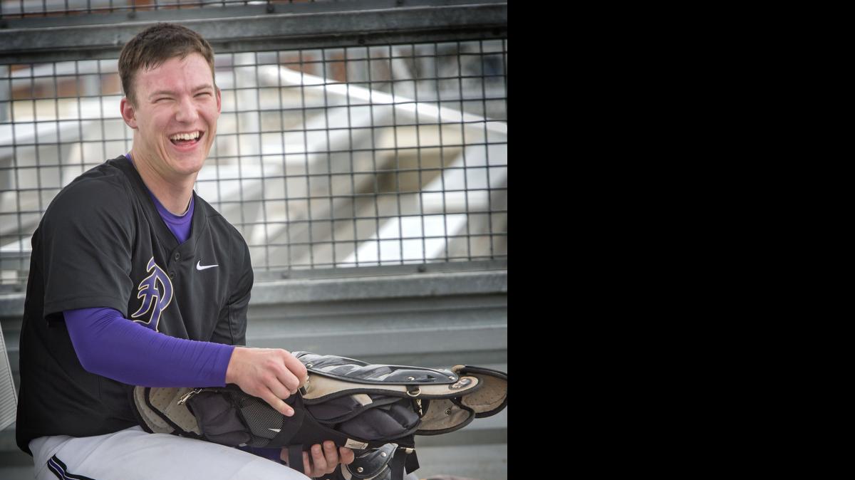 
Puyallup High School catcher Brendan Illies, a North Carolina commit, gears up for practice at Heritage Park in Puyallup on Thursday, Mar. 19, 2015.
