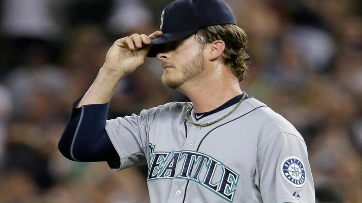 
Mariners reliever Mark Lowe reacts after giving up a two-run home run to Detroit’s Ian Kinsler in the eighth. 
