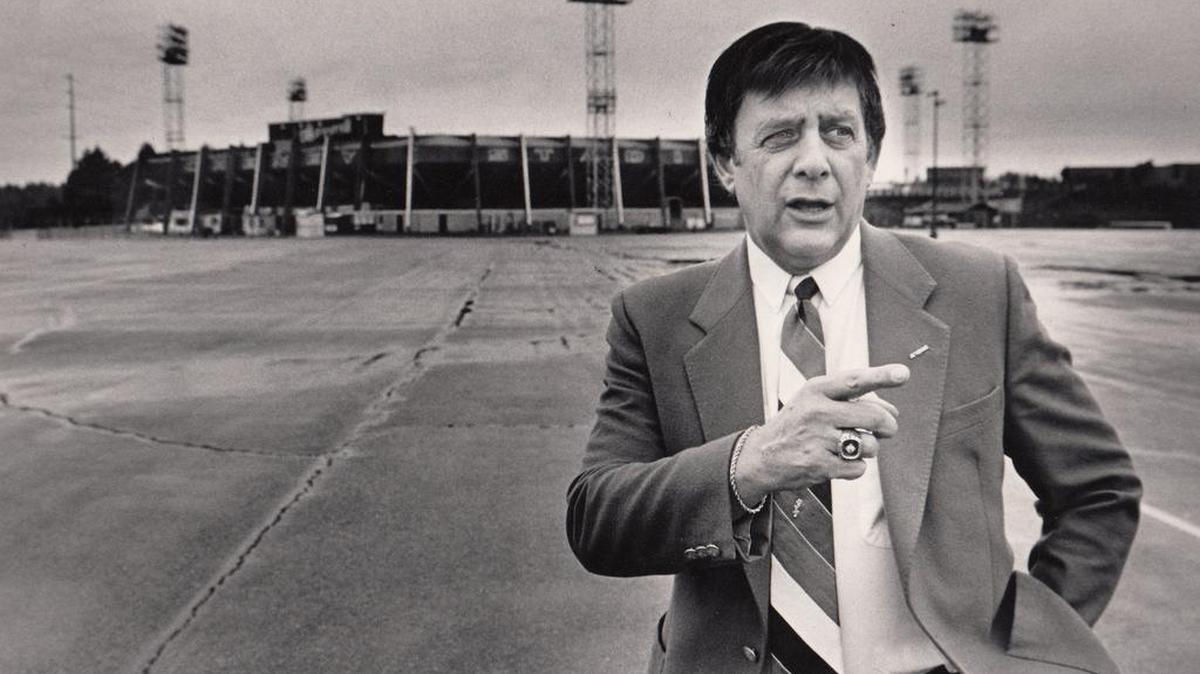 Stan Naccarato stands in front of Cheney Stadium in 1987. He died Wednesday at the age of 88.