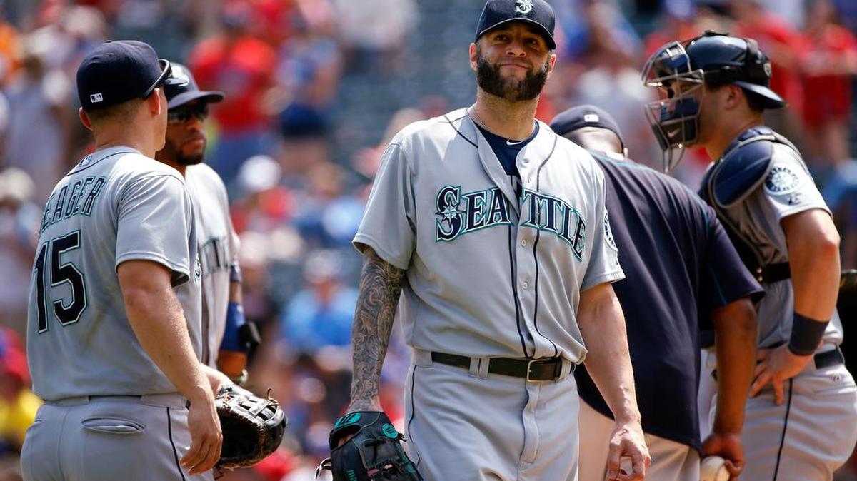 
Seattle Mariners relief pitcher Joe Beimel leaves the mound after giving up three straight home runs to the Texas Rangers during the seventh inning of a baseball game Wednesday, Aug. 19, 2015, in Arlington, Texas. The Rangers defeated the Mariners 7-2.
