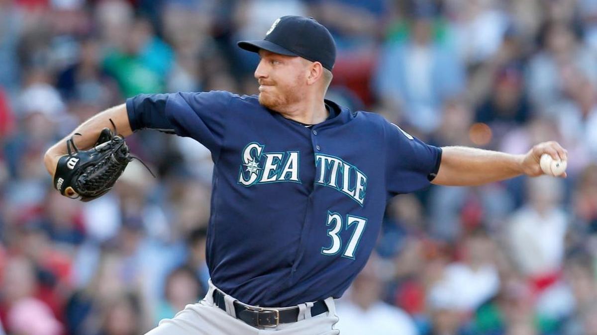 FILE - In this Saturday, June 18, 2016 file photo, Seattle Mariners relief pitcher Mike Montgomery (37) pitches during the sixth inning of a baseball game against the Boston Red Sox at Fenway Park in Boston. The Mariners traded the left-hander to the Chicago Cubs for first baseman and designated hitter Dan Vogelbach, Wednesday, July 20, 2016.