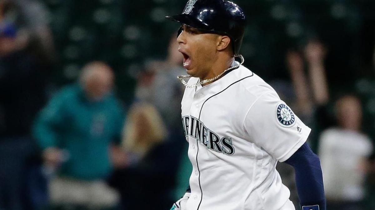 Seattle’s Leonys Martin yells as he rounds the bases after hitting a two-run walk-off home run in the ninth inning against the Oakland Athletics on Tuesday, May 24, in Seattle. The Mariners won 6-5.