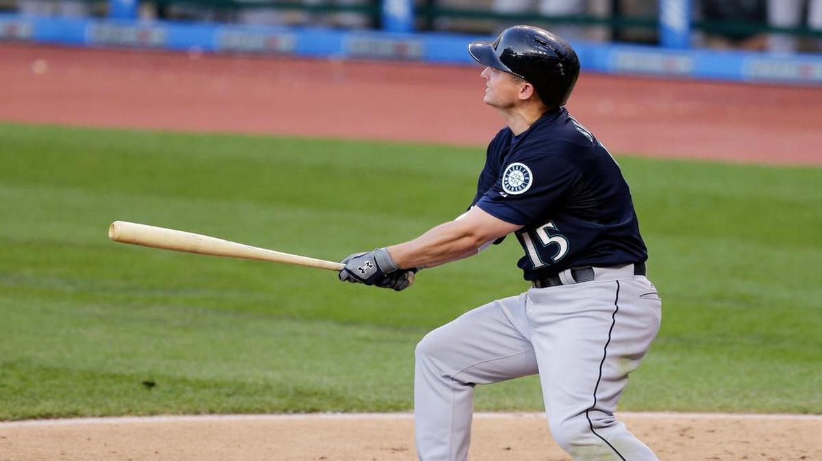 
Seattle Mariners third baseman Kyle Seager watches his grand slam off Cleveland Indians starting pitcher Trevor Bauer during the third inning Wednesday in Cleveland.
