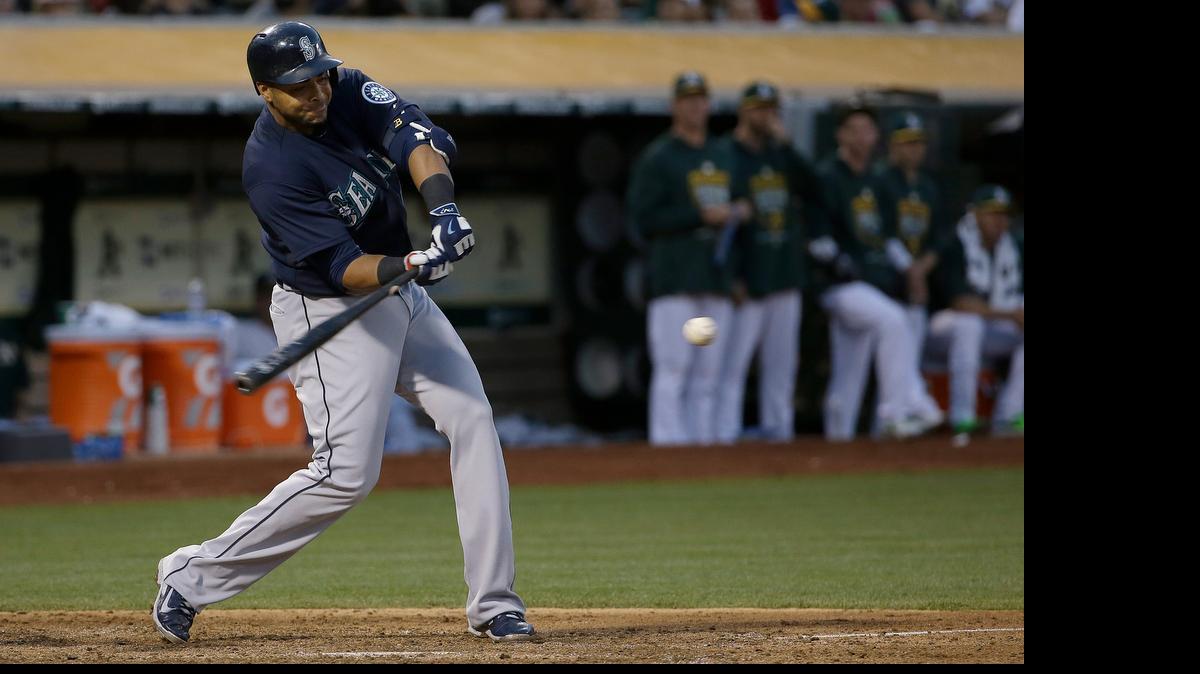
Nelson Cruz connects on a two-run homer in the eighth inning to give the Mariners a 6-3 lead over the A’s on Friday night in Oakland. Logan Morrison, Seth Smith and Brad Miller also slugged two-run homers for Seattle.
