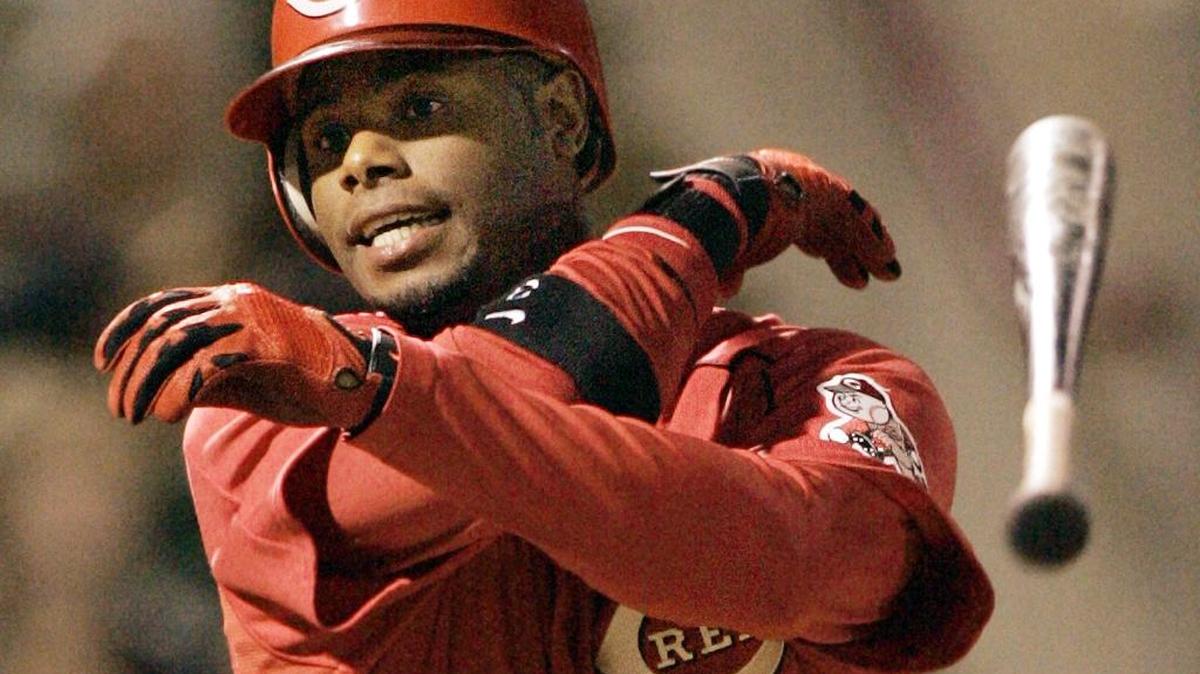 Cincinnati Reds Ken Griffey Jr.,flips his bat away after hitting a fly ball to Pittsburgh Pirates right fielder Jeromy Burnitz for the second out of the fifth inning of the spring training game in Sarasota, Fla., on Monday, March 27, 2006.