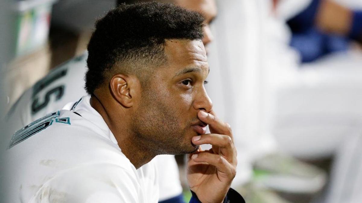 Seattle’s Robinson Cano sits in the dugout during the ninth inning of a baseball game against the Texas Rangers, Monday, April 11, 2016, in Seattle. Cano was 0-4 at the plate as the Rangers beat the Mariners, 7-3.