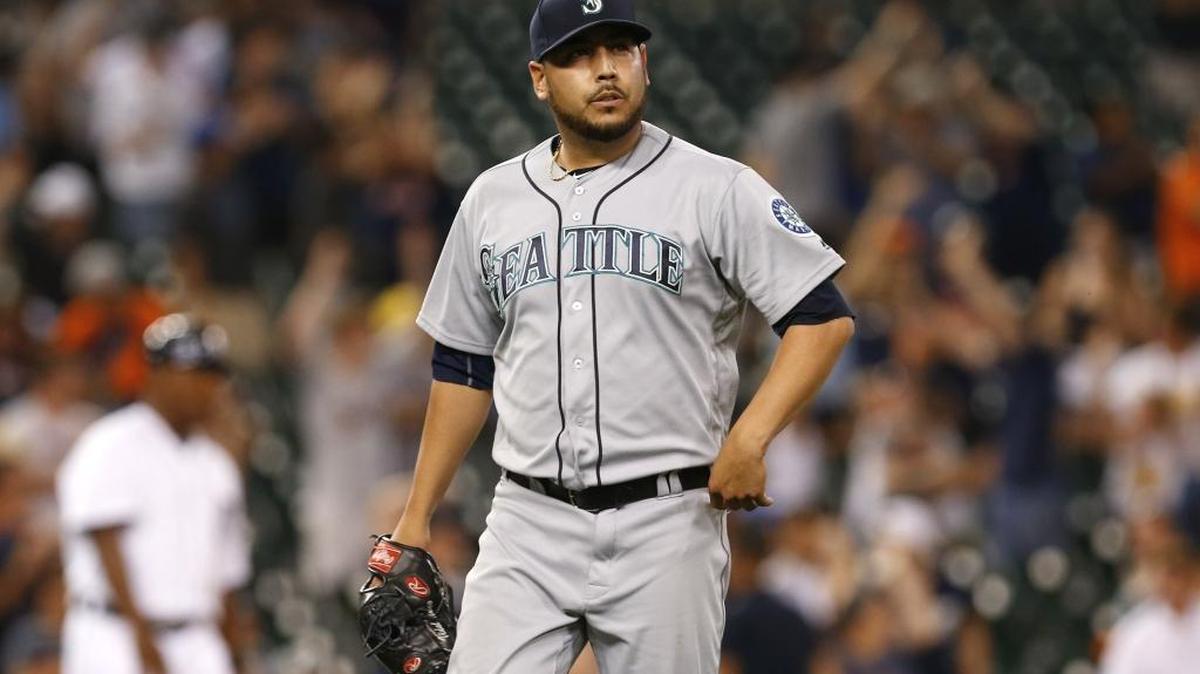 Seattle relief pitcher Vidal Nuno walks off the field after giving up a solo home run to Detroit’s Justin Upton during the 12th inning Monday, June 20, in Detroit.