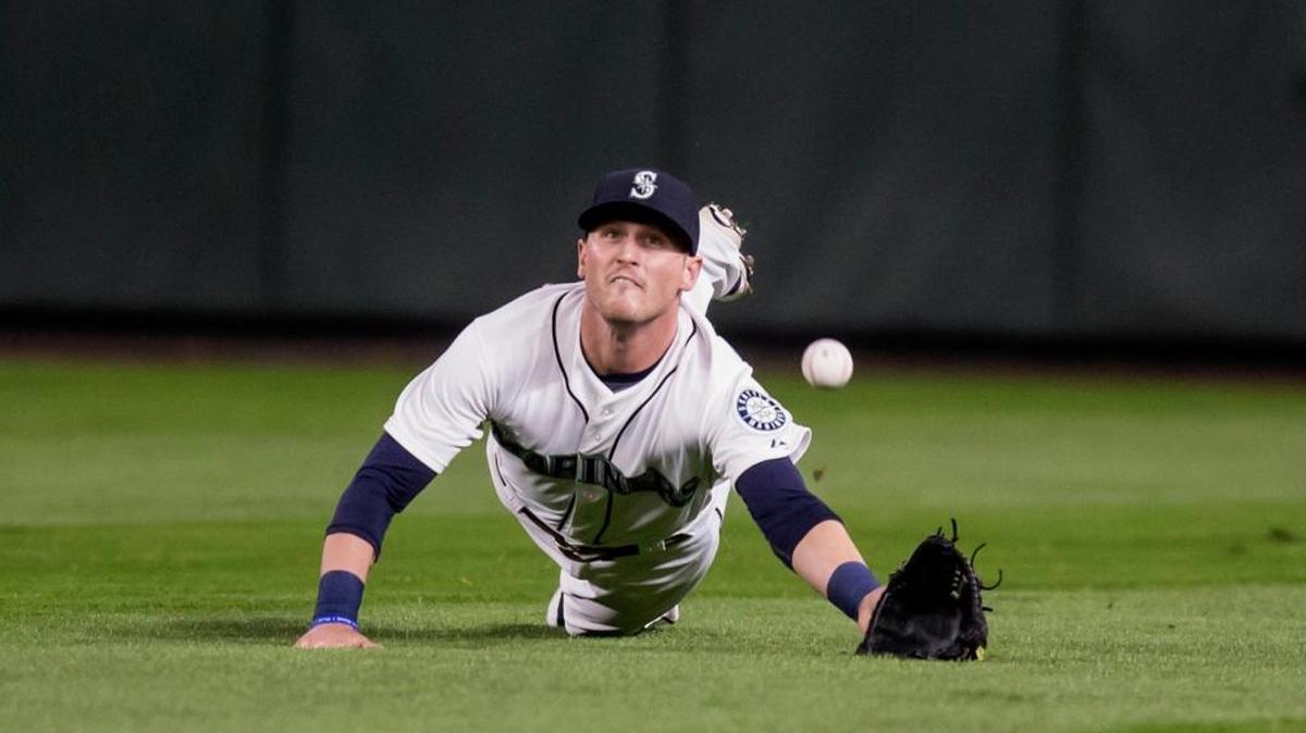 
Mariners center fielder Shawn O’Malley dives for a hit by Houston’s Colby Rasmus in the fourth inning Wednesday. The game was in progress when The Olympian went to press. Read all about it at theolympian.com.
