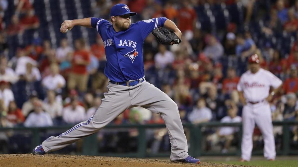 Drew Storen, shown pitching for Toronto against the Philadelphia Phillies on June 15, grew up a fan of the Mariners and Ken Griffey Jr.