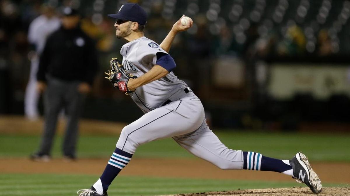 Mariners pitcher Steve Cishek works against the Oakland Athletics in the ninth inning Monday, May 2, in Oakland, Calif.