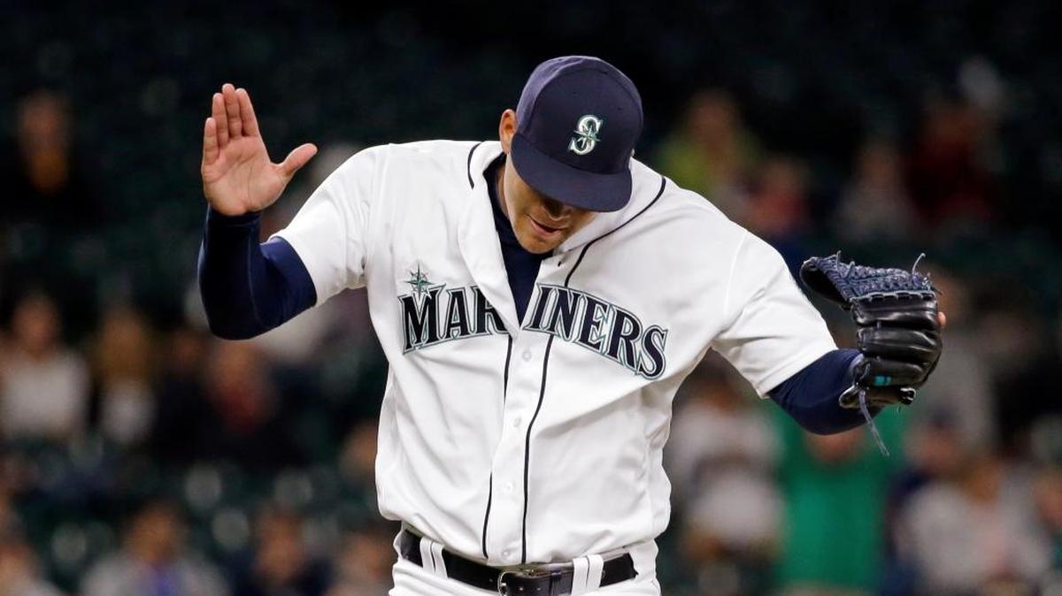 Seattle Mariners starting pitcher Taijuan Walker claps his hands together after striking out Cleveland Indians’ Michael Martinez to end the top of the eighth inning of a baseball game Wednesday, June 8, 2016, in Seattle.