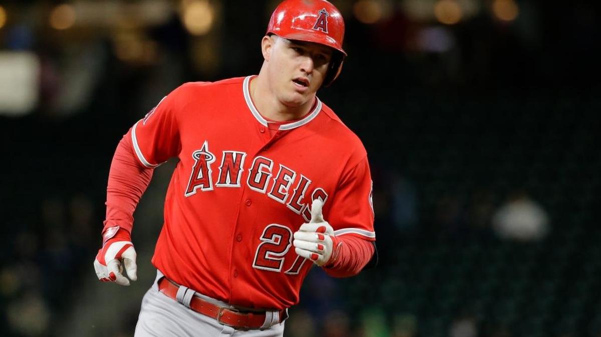 
Los Angeles Angels’ Mike Trout rounds the bases after hitting a home run against the Seattle Mariners, Tuesday, Sept. 15, in Seattle. 
