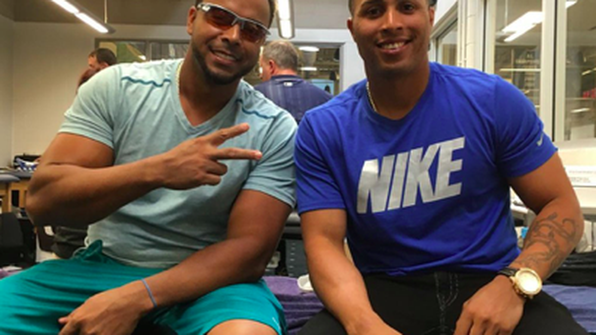 Leonys Martin, right, is enjoying his time in Seattle with his friend and mentor Nelson Cruz.