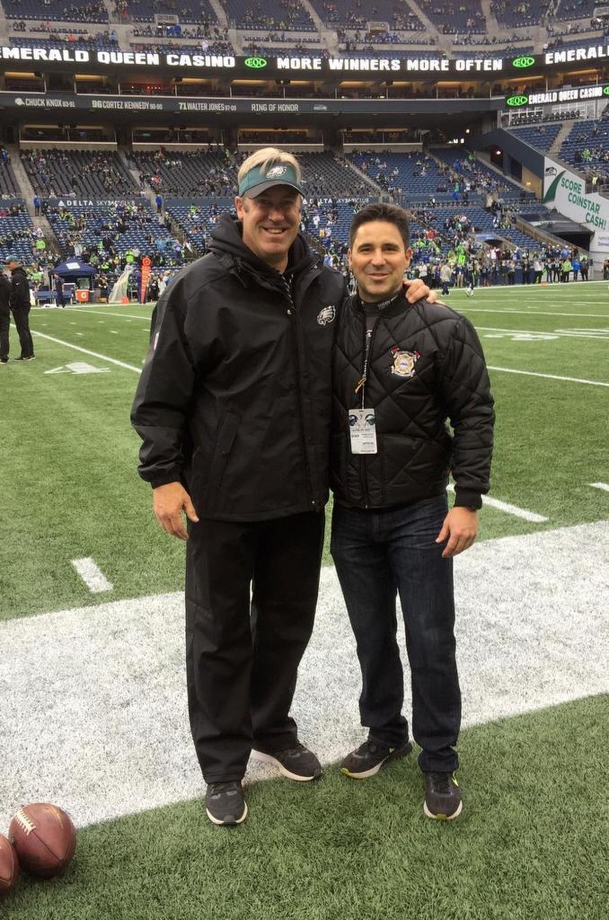 Former Ferndale teammates Doug Pederson, left, and Donnie Finkbonner met at CenturyLink Field in Seattle Dec. 3, when Pederson’s Eagles played the Seahawks.