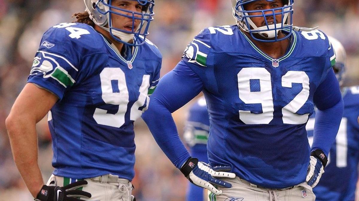 
Seahawks linebacker Chad Brown (94) and defensive end Lamar King (92) line up during a game against the Miami Dolphins at Husky Stadium in 2001. Brown was a three-time Pro Bowler during 15 seasons in the NFL, playing eight years with the Seahawks.
