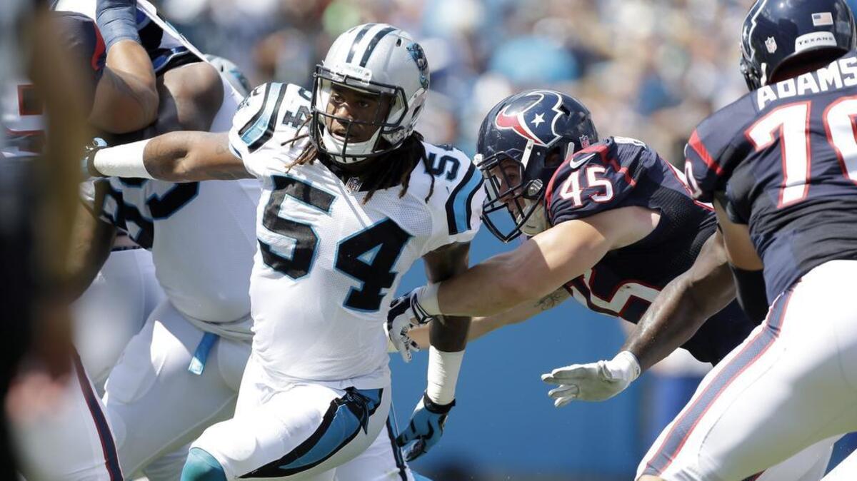 
Carolina linebacker Shaq Thompson (54) pressures the Houston quarterback earlier this season. Thompson, who starred for three years at the University of Washington, said he is excited to face off with Seahawks running back Marshawn Lynch on Sunday.
