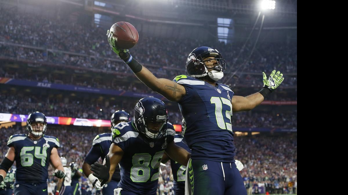 
Seahawks wide receiver Chris Matthews (13) celebrates his touchdown catch during Super Bowl 49 earlier this year.
