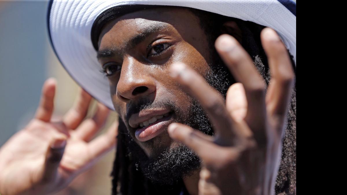 
Seattle Seahawks’ Richard Sherman speaks to the media following an NFL football organized team activity Tuesday. 
