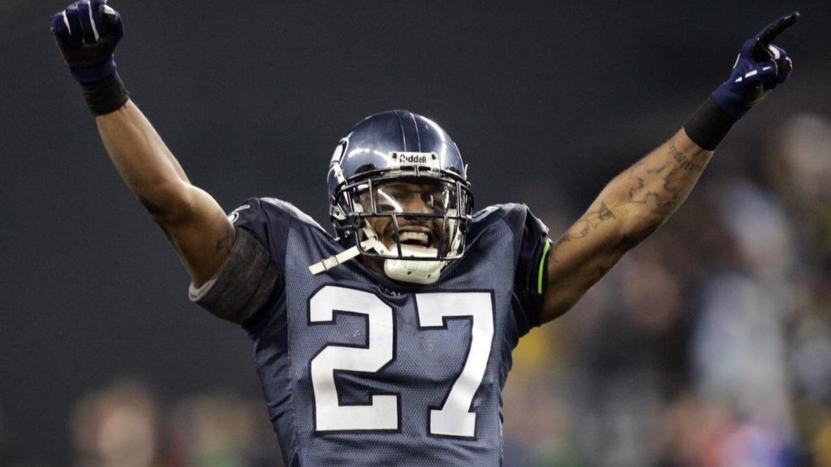 Seahawks safety Jordan Babineaux celebrates his game-saving tackle of Cowboys quarterback Tony Romo during a 2007 playoff game in Seattle. Plays like that one earned Babineaux the nickname, “Big Play Babs.”
