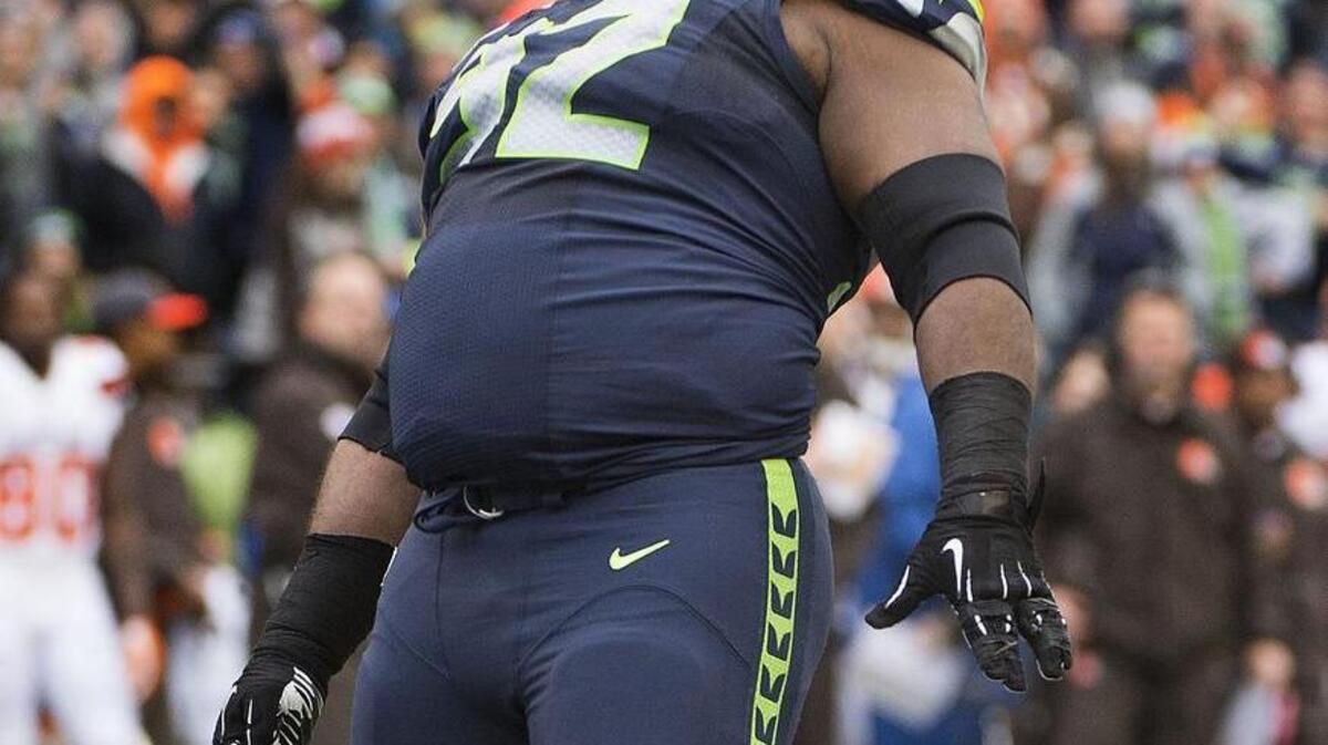 Seahawks defensive tackle Brandon Mebane celebrates a sack Sunday with his famous belly roll dance.